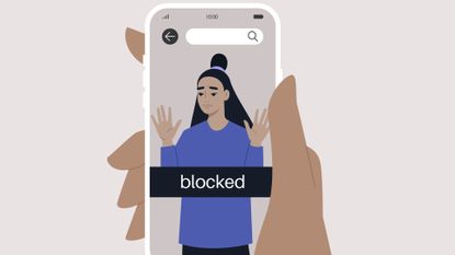 Hand holding a smartphone with a blocked user account