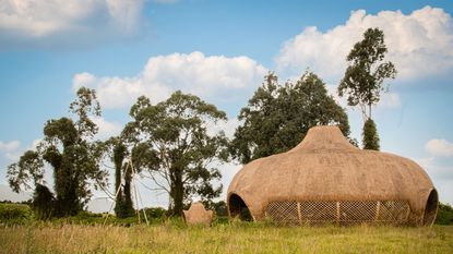 Organizmo House of Thought and dry toilet to the left