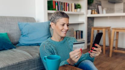 Woman making an online payment from home 