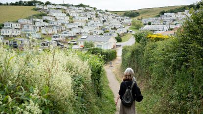 Walkers near a caravan park in Beer, Devon