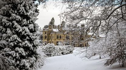 Exterior of Palé Hall hotel in the snow