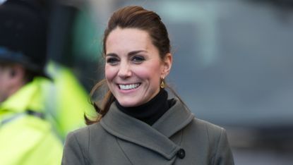 Catherine, Princess of Wales, wearing a green Reiss coat, visits Denbigh in North Wales in 2015