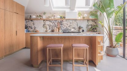 Oak kitchen with reeded cabinets and island