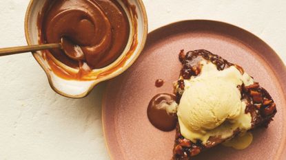 Upside-down sticky pear and walnut cake