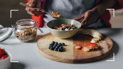 Bowl of cereal and fruit being prepared early in the morning, representing not doing exercise on an empty stomach