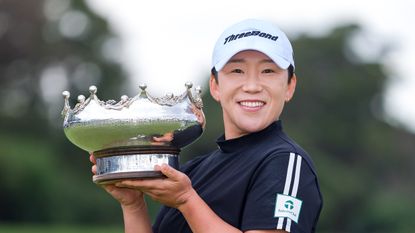 Jiyai Shin poses with the 2024 Australian Open Championship