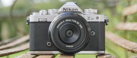 The Nikon Z fc camera on a park bench