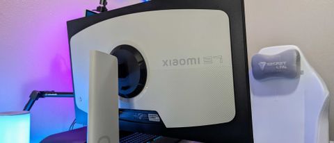 The Xiaomi G Pro 27i as seen from behind, showing the white back and &quot;Xiaomi 27&quot; logo.