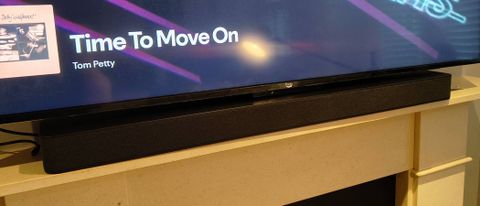 The Amazon Fire TV Soundbar Plus under an Amazon TV.