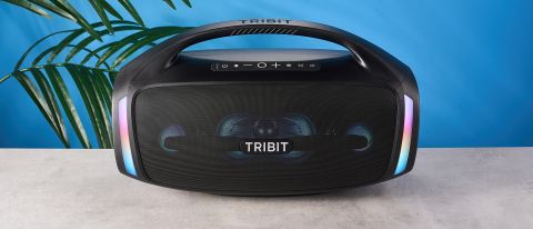 the tribit stormbox blast 2 bluetooth speaker, 18 inches long and weighing 19 pounds, with multicolored LED lights and a carry handle