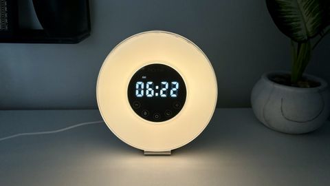 hOmeLabs Sunrise Alarm Clock with digital time on display surrounded by ring light.