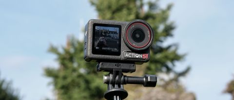 The DJI Osmo Action 5 Pro against an outdoors background