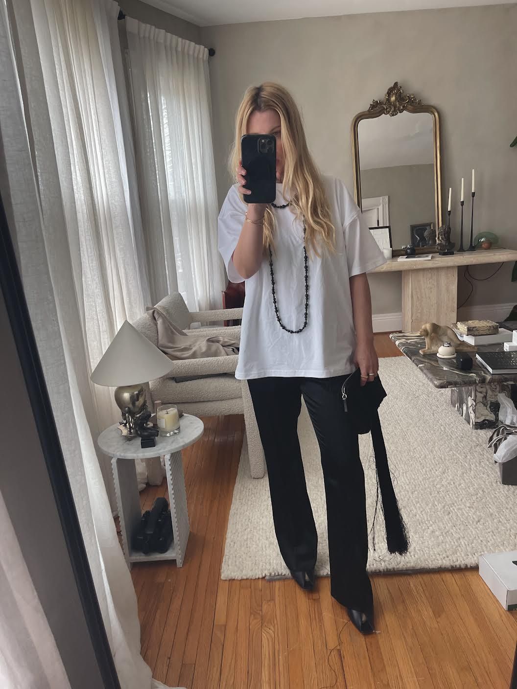 Kerry Pieri wears an oversized Jennifer Behr necklace