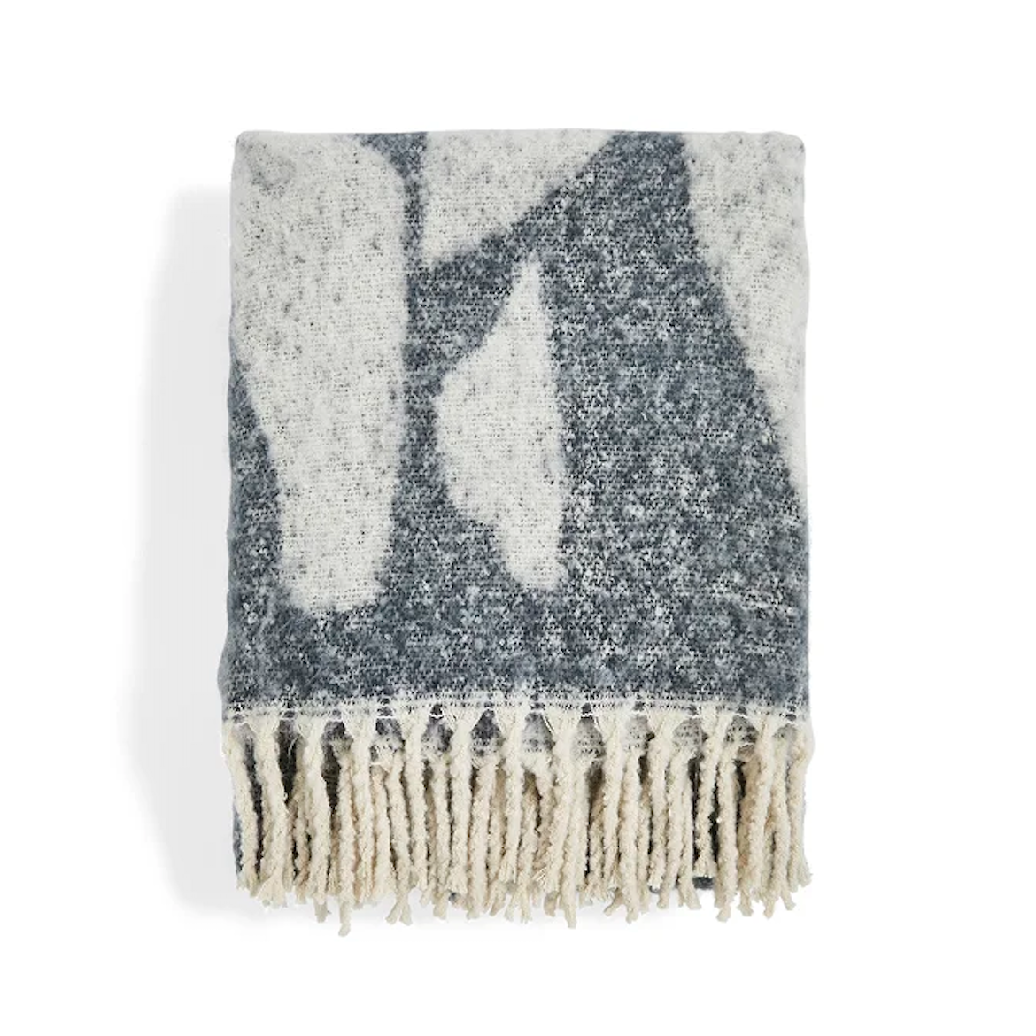 blue patterned throw with tassels