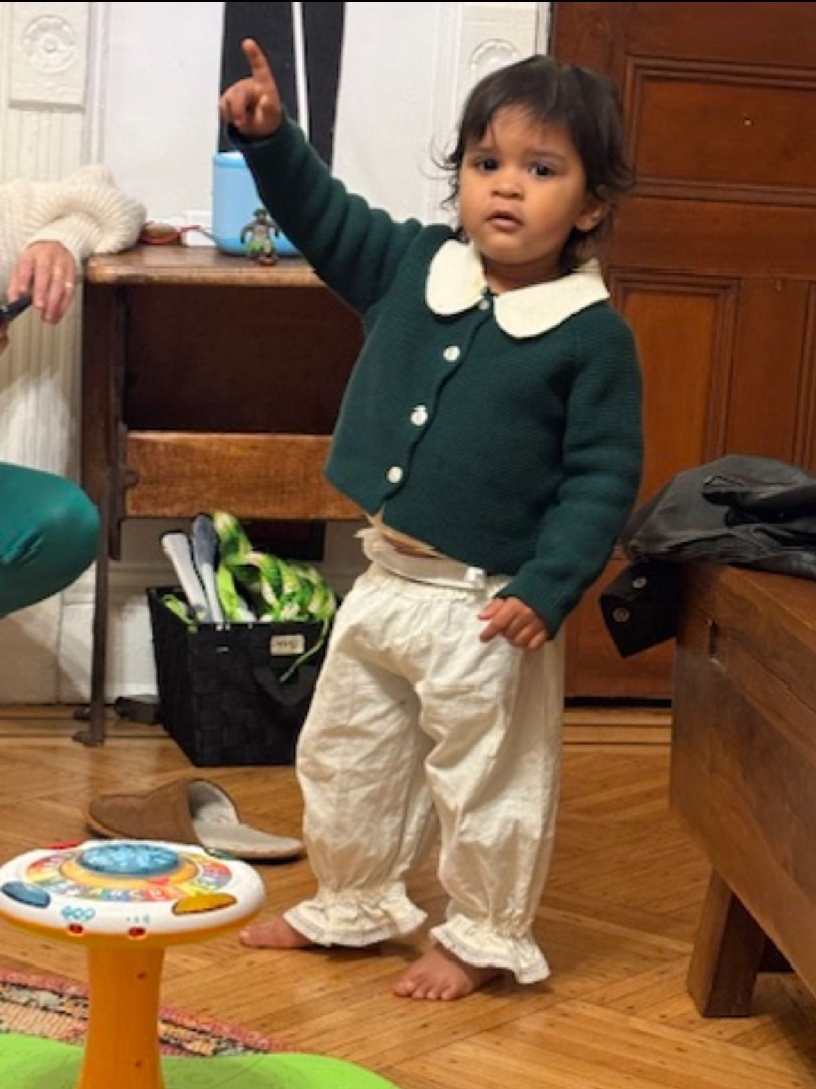 Jack show off impeccable toddler style in a collared contrast cardigan and cuffed pants