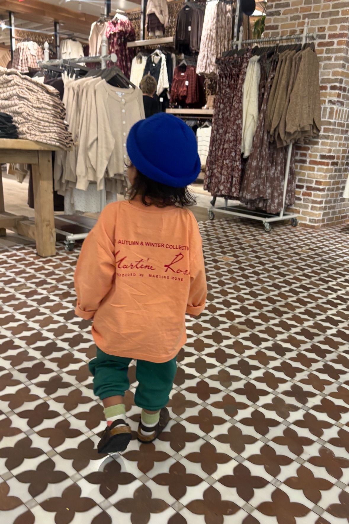 Another winning Jack outfit featuring a royal blue hat and peach long sleeve