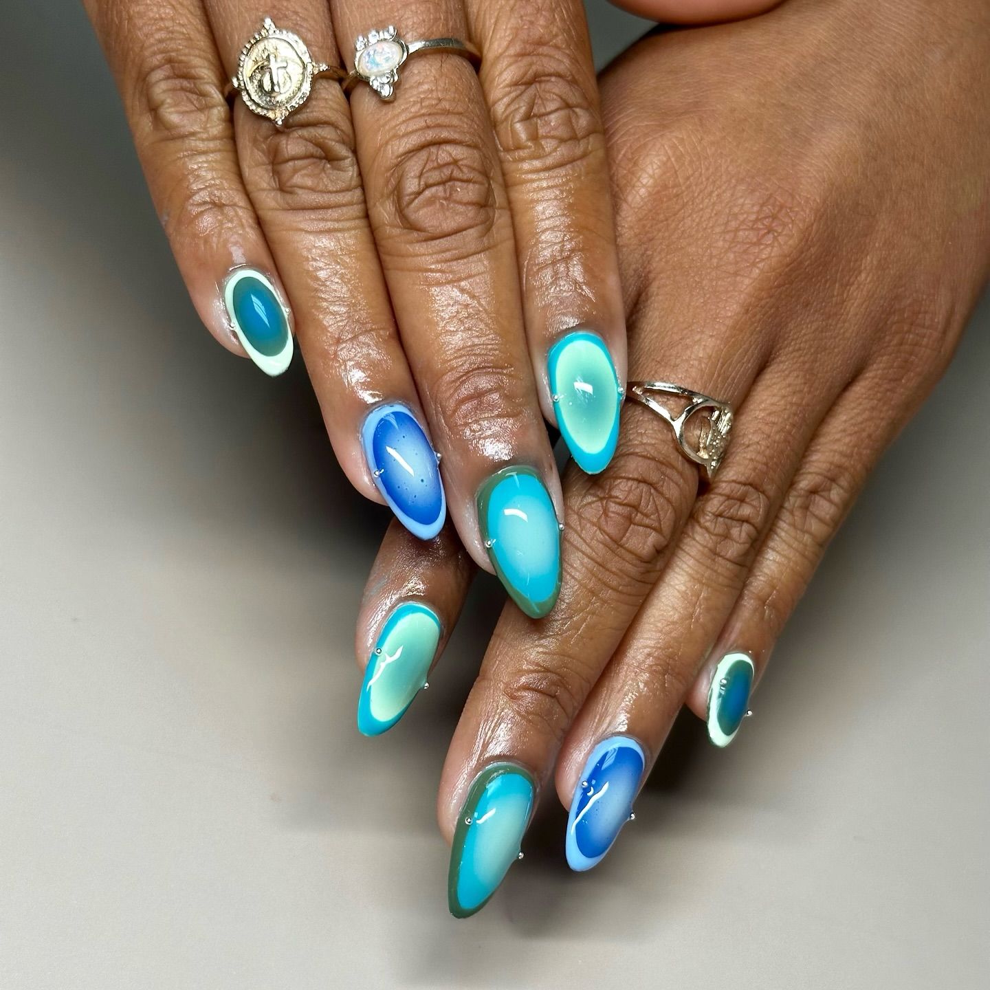 blue manicure with different shades