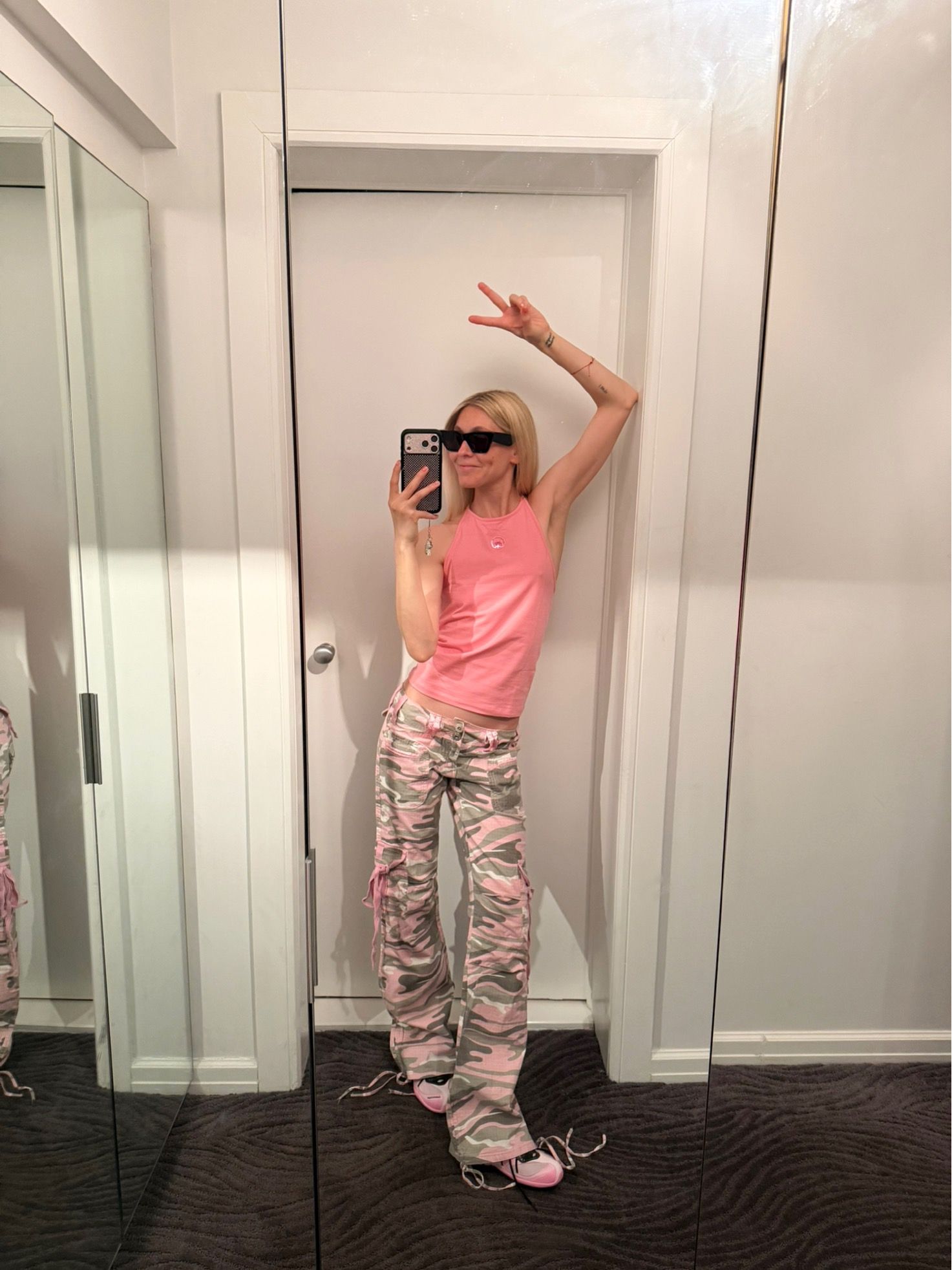 Jessica Minkoff styles a pink shirt with pink camo pants