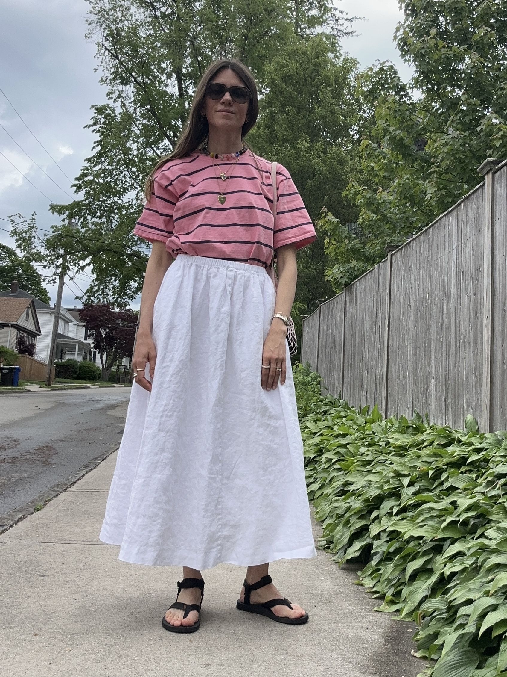 Julia Gall styles an oversized tee with a long white skirt