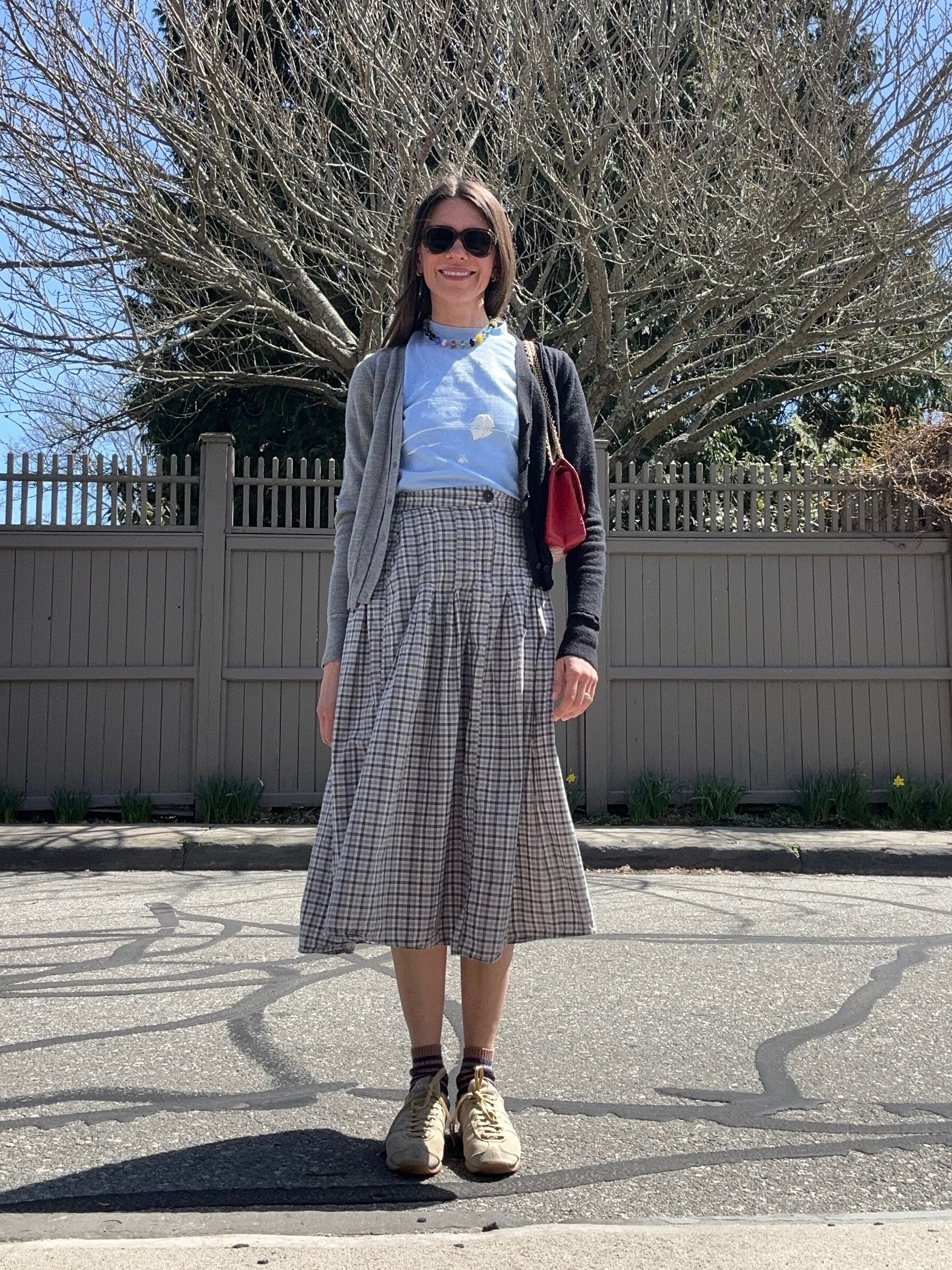 Julia Gall uses a cardigan to show off a fun tee