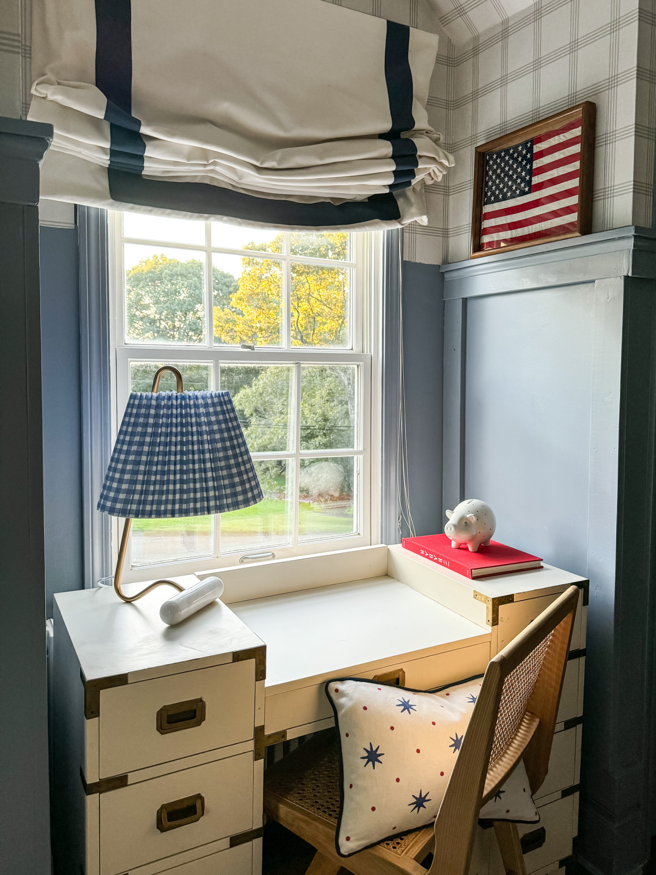 blue kids room with white campaign desk