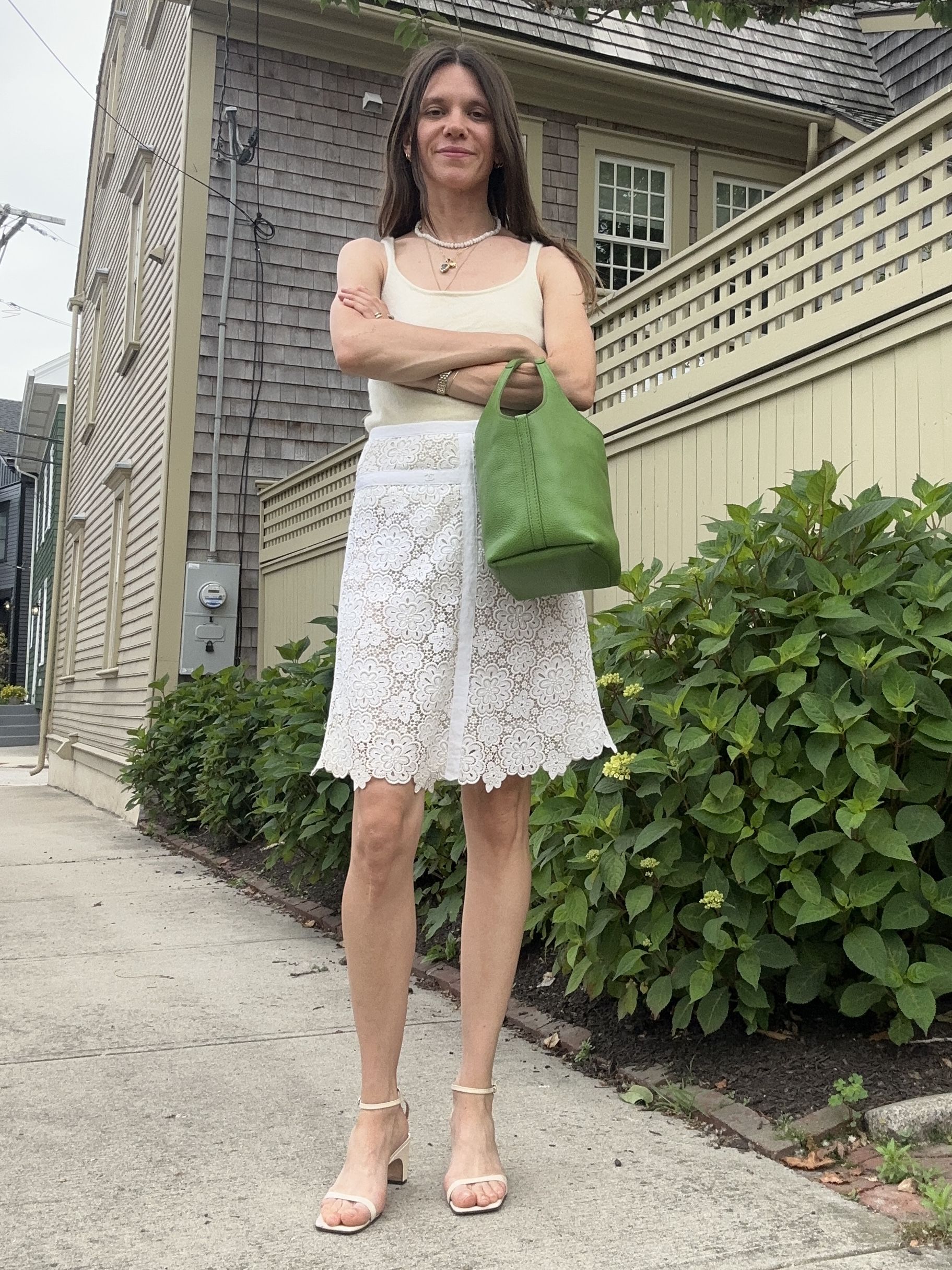 Julia Gall demonstrates how to dress like a Hugo spritz in neutrals and lime