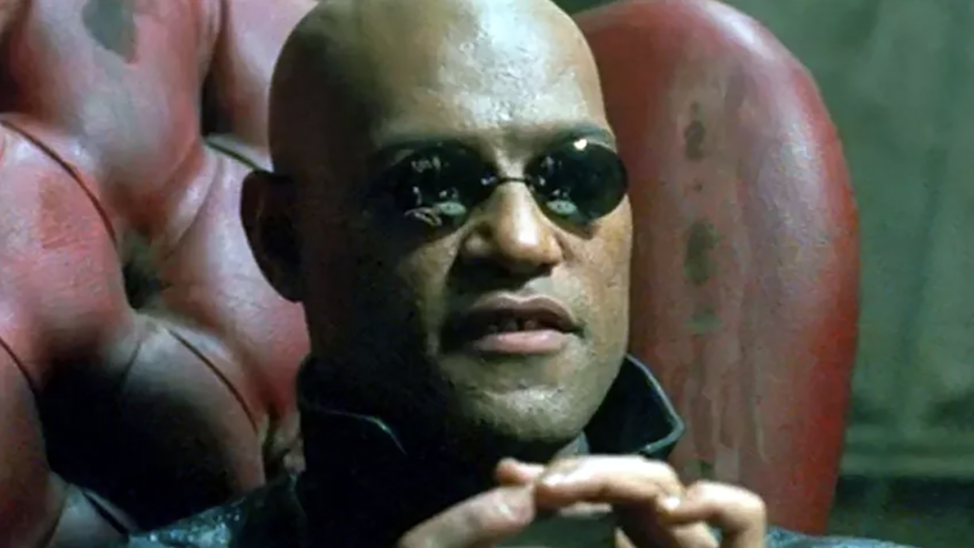 A still from the Matrix showing a close-up of Morpheus