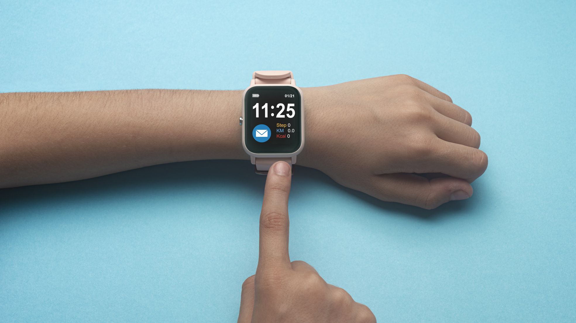 Girls hands Checking Smart Watch on light blue background