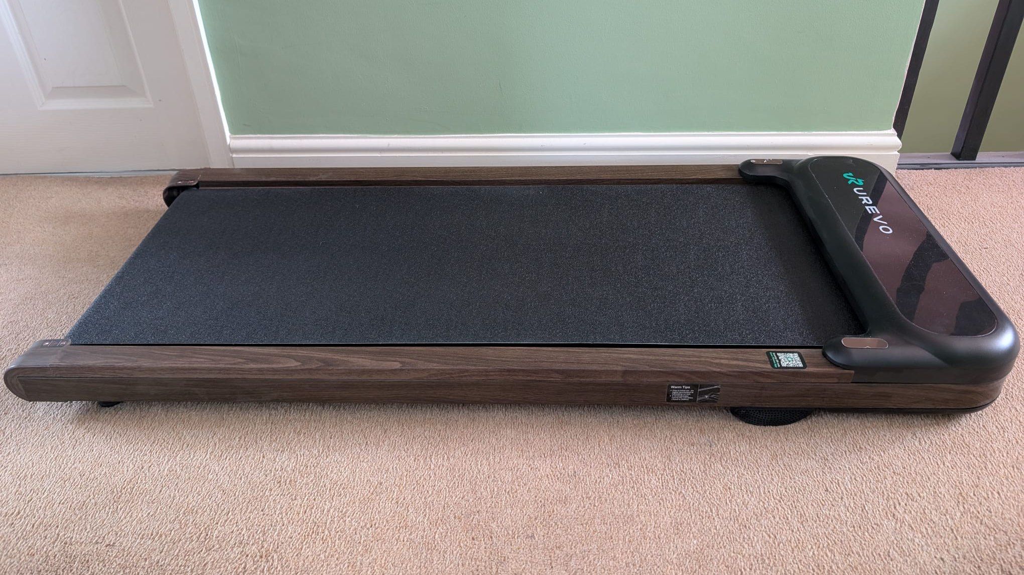Sick and tired of ugly under-desk treadmills? With its wood grain 