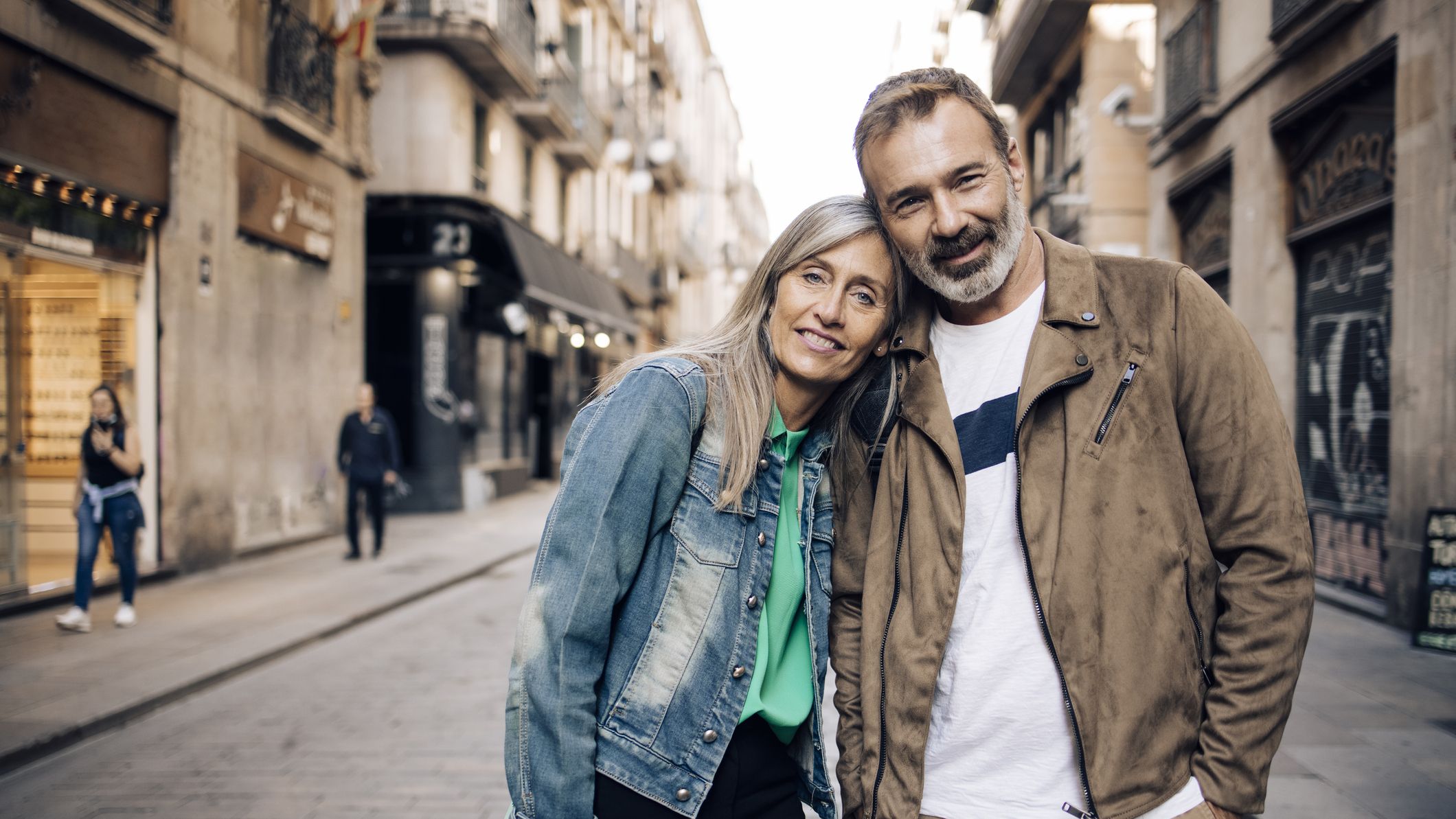 Portrait of a mature couple enjoying their romantic journey in Barcelona.