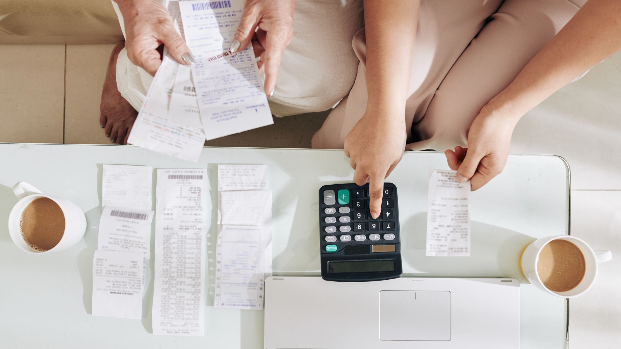 Two people gathering insurance documentation