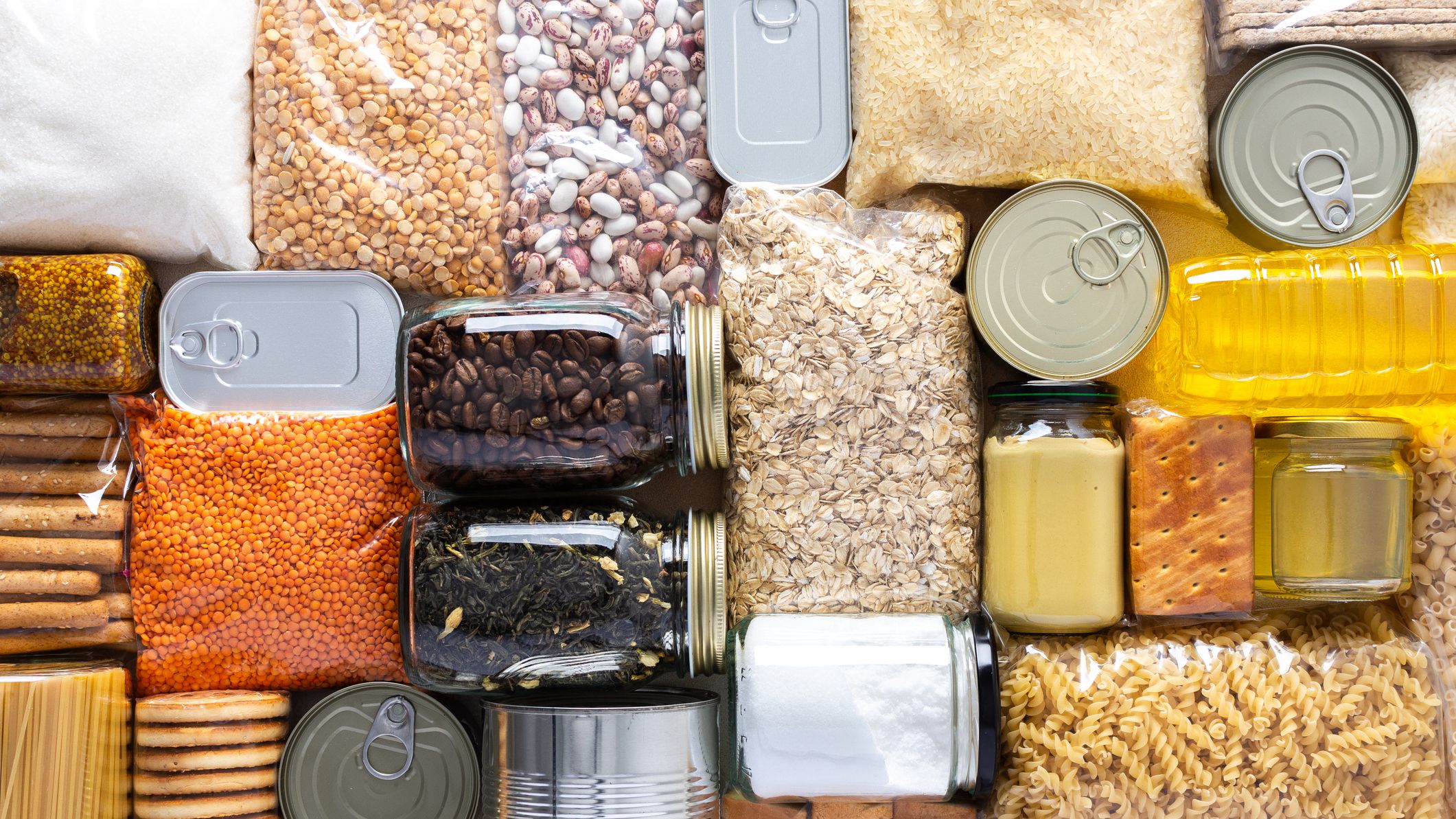 Home food supplies, including canned food, cereals, pasta, and essential staples