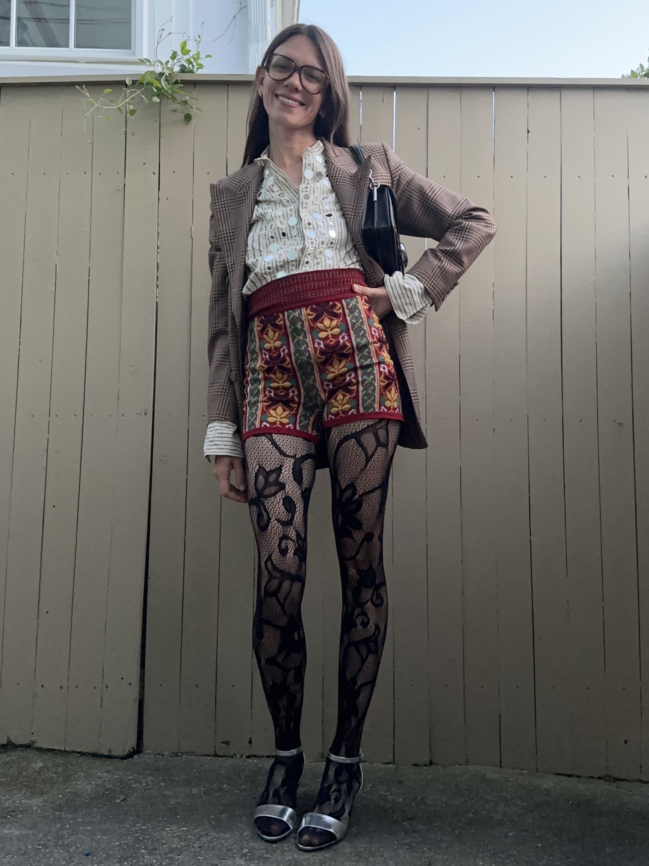 Julia Gall styles dressy sandals for fall with playful tights