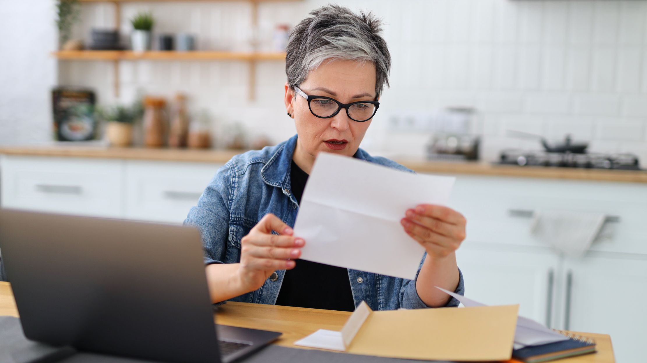 A woman reads surprising news