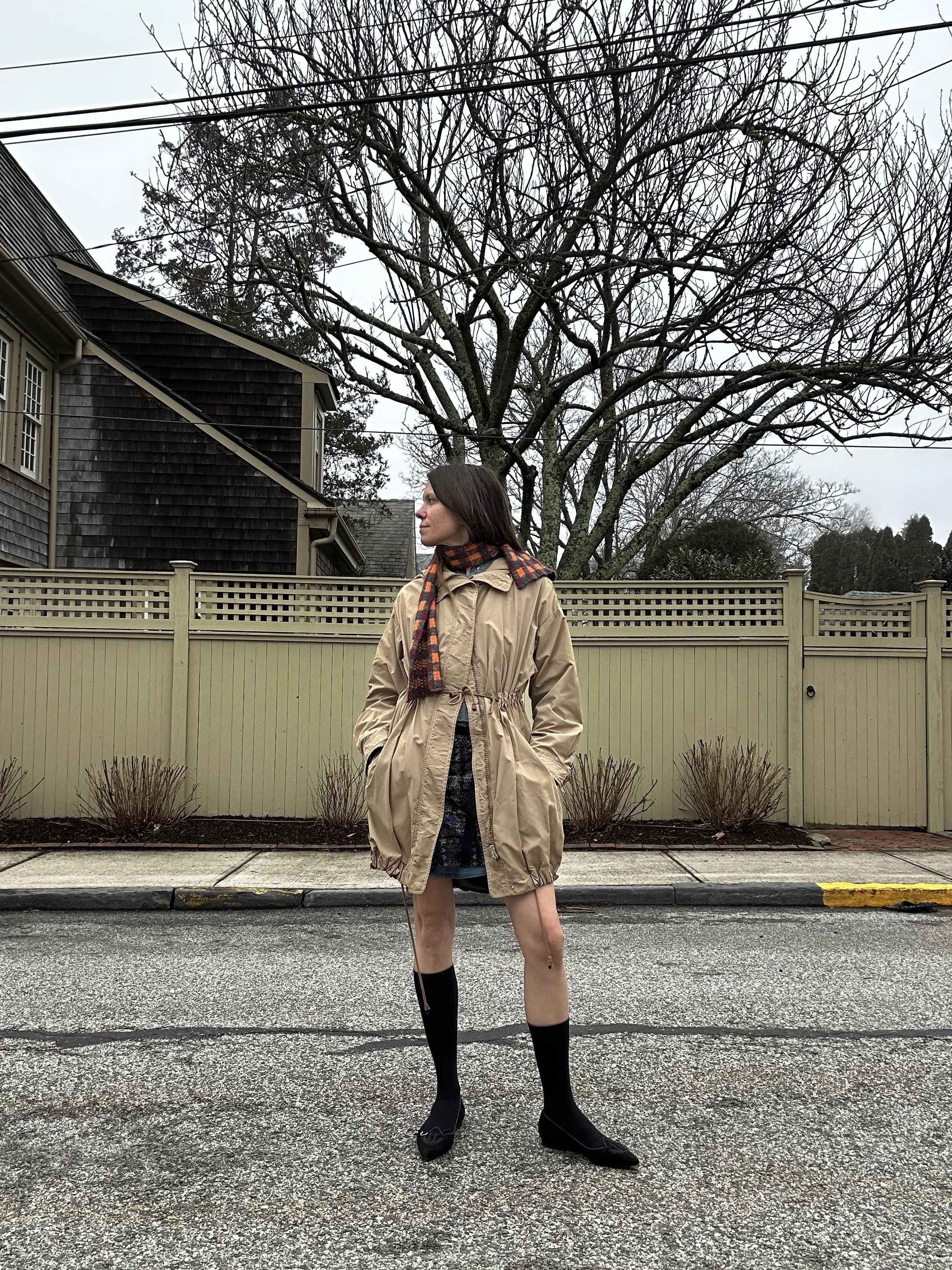 Julia Gall cools down her Prada-inspired layered look in a parka