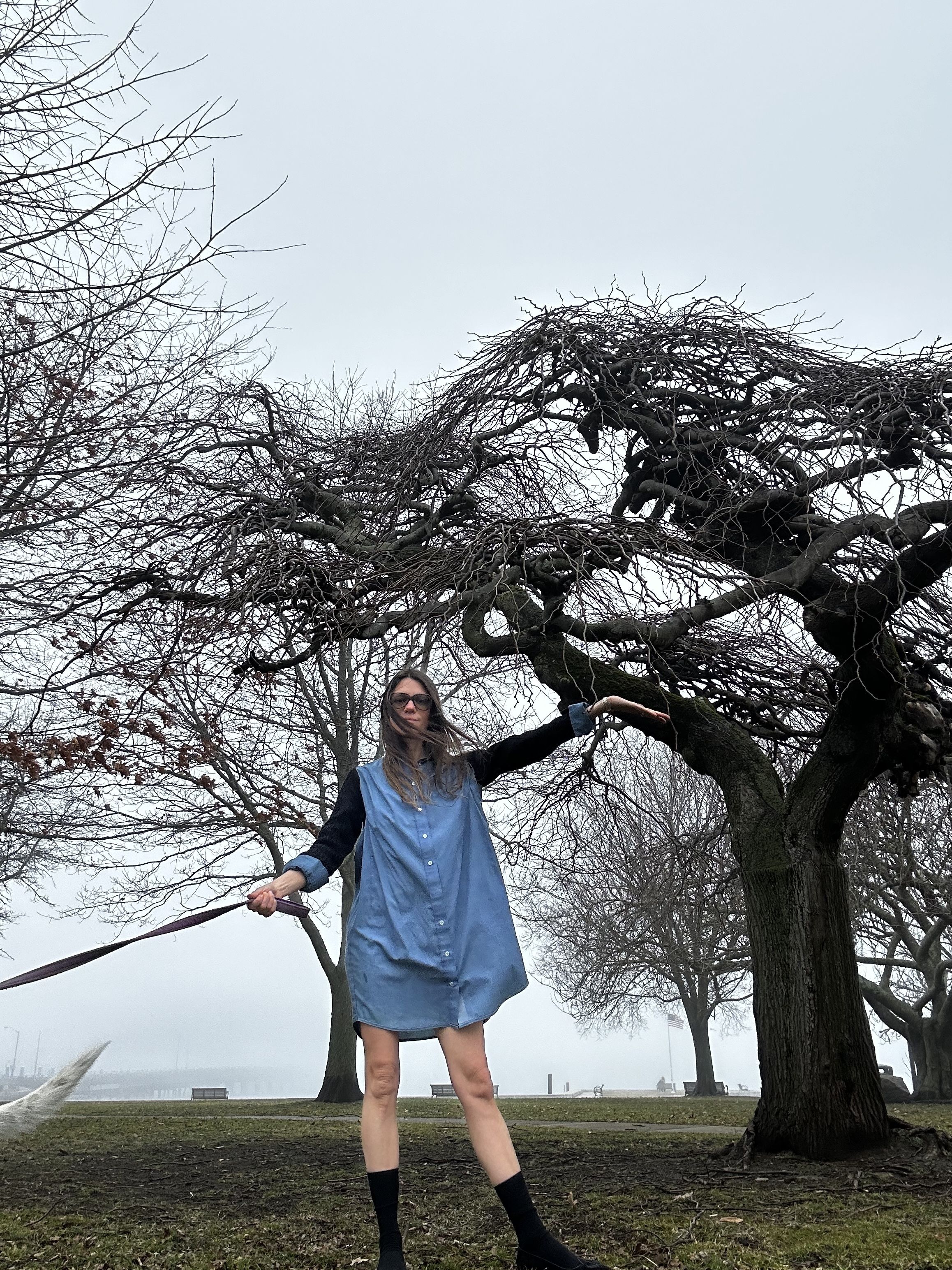 Julia Gall de-layers in a long-sleeved cuffed shirt dress and calf socks