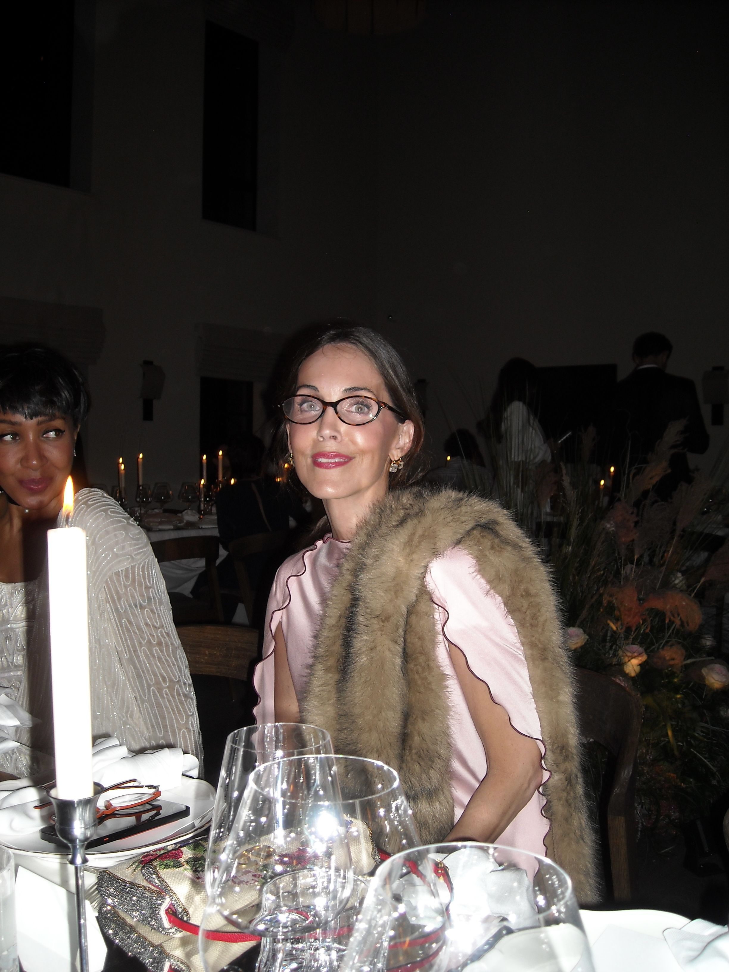 Larissa Mills styles a faux fur stole with a satin evening dress