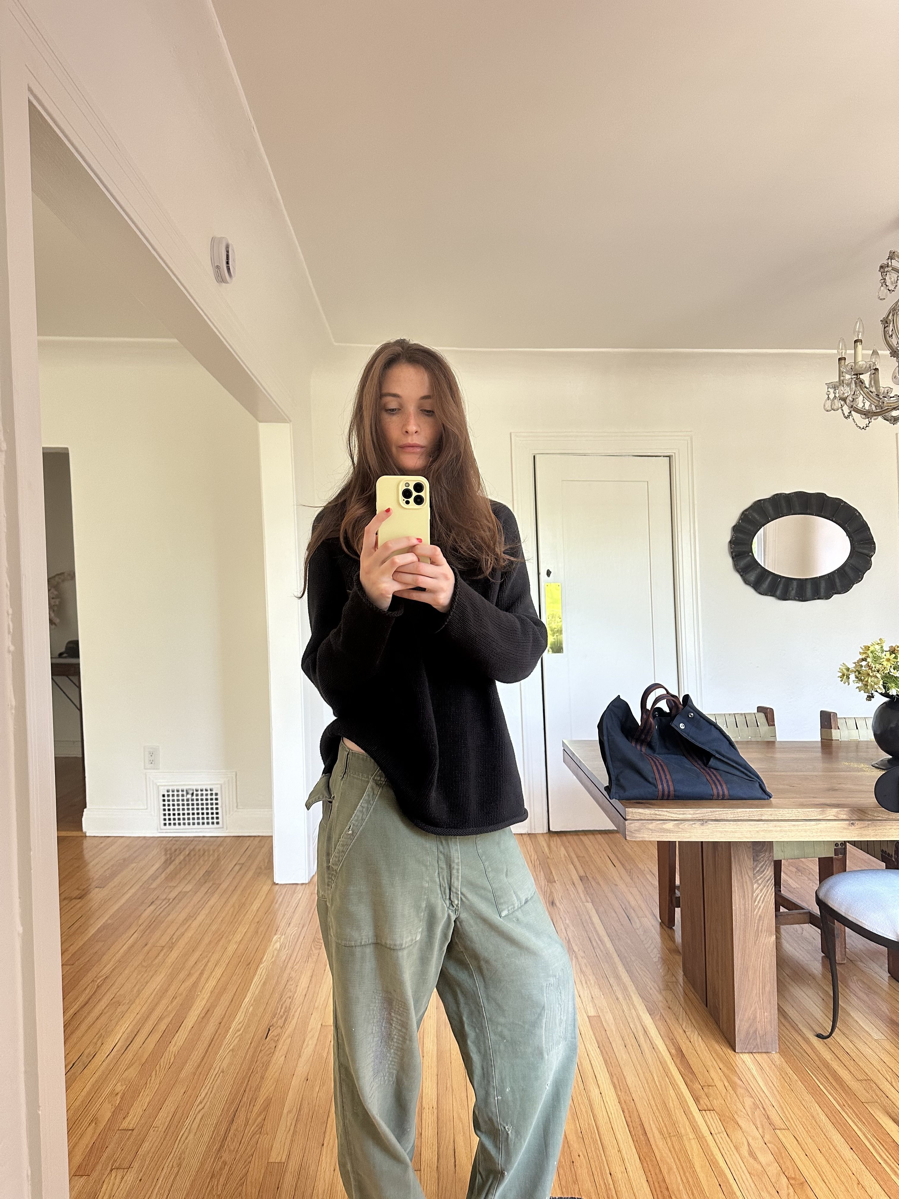 Grace O'Neill Dougherty warms up a casual look with a black roll neck sweater