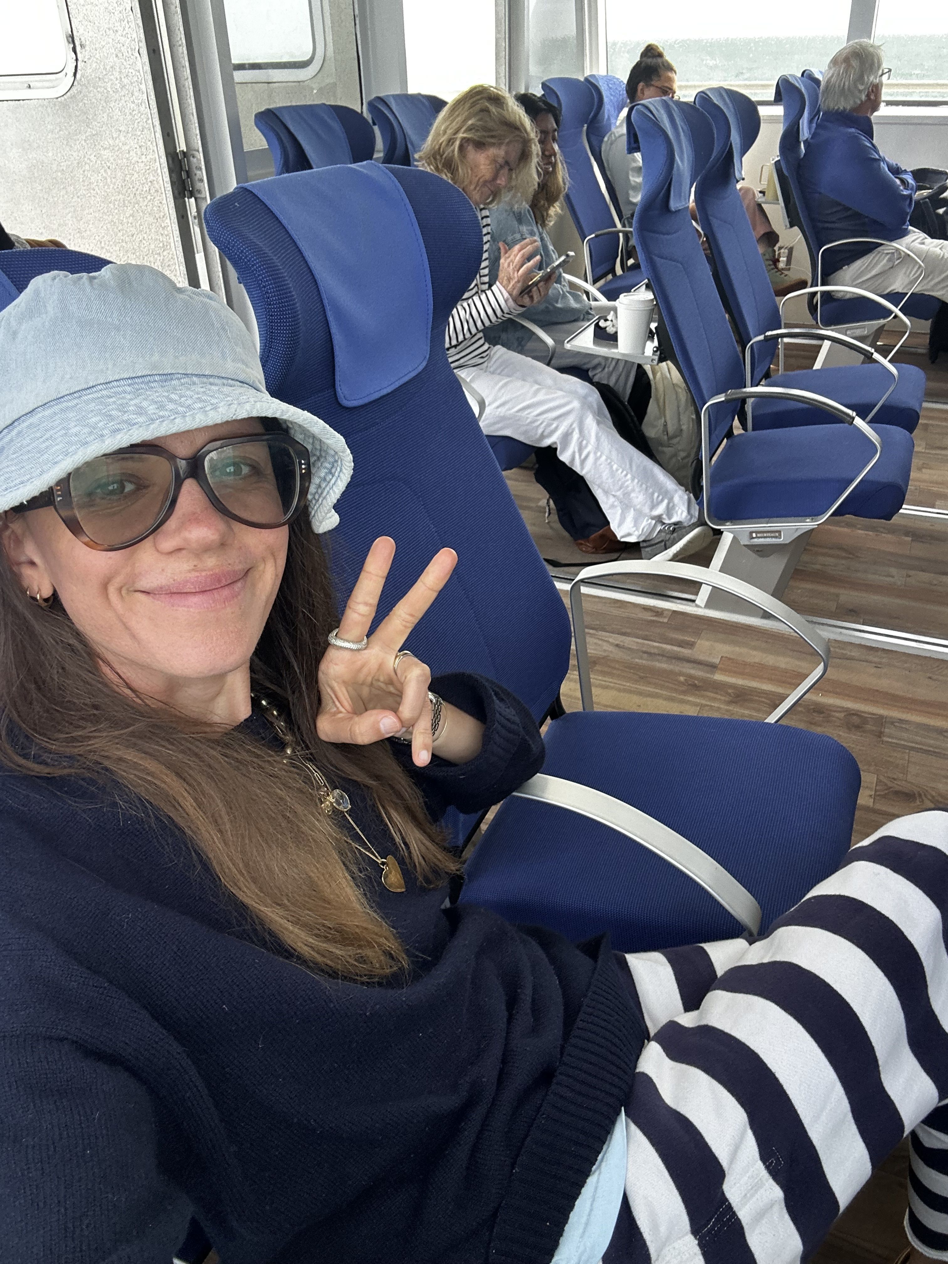 Julia Gall wears striped pants on the ferry to Nantucket