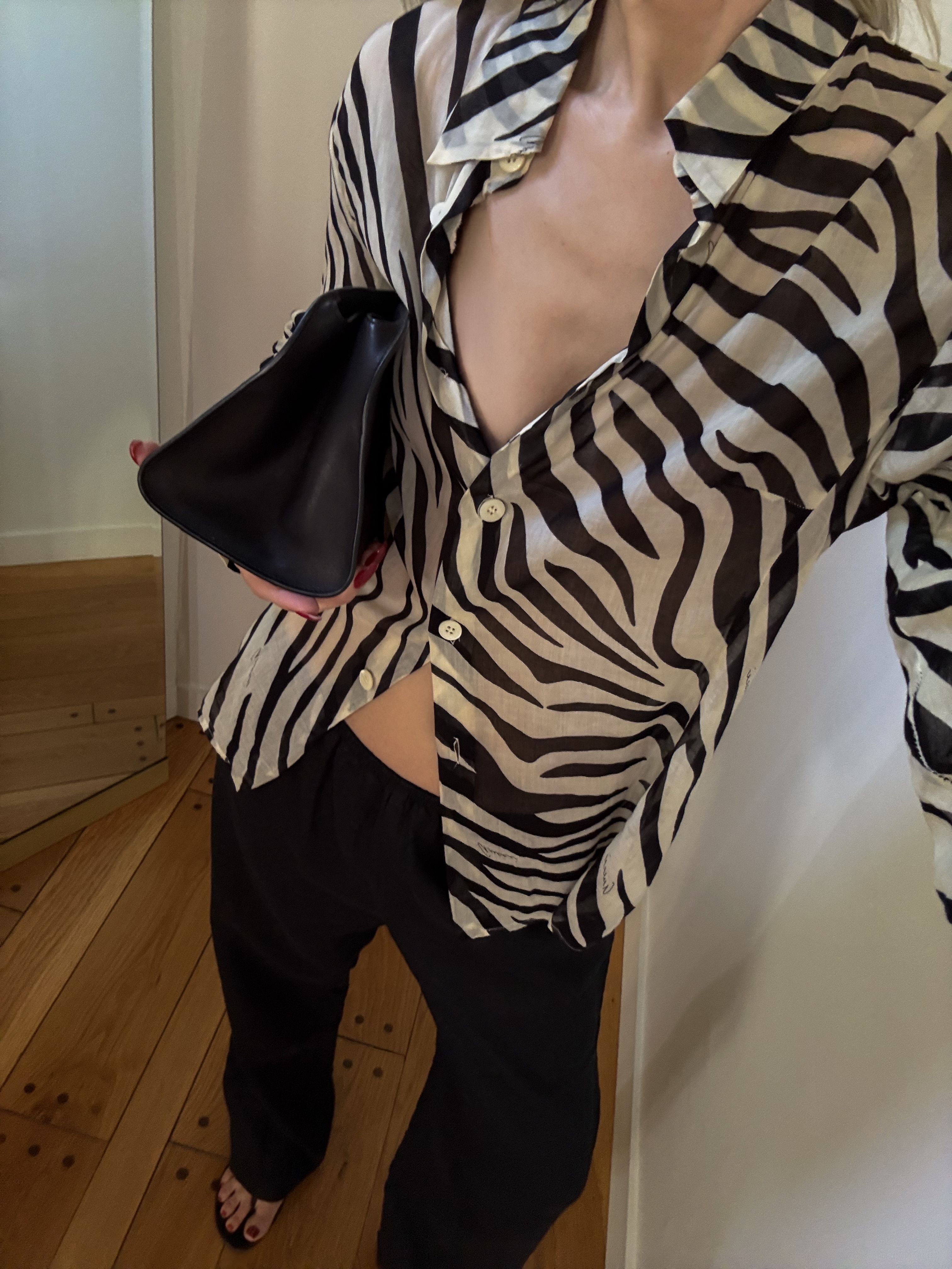 Angela Fink styles a zebra print button-down with summer pants