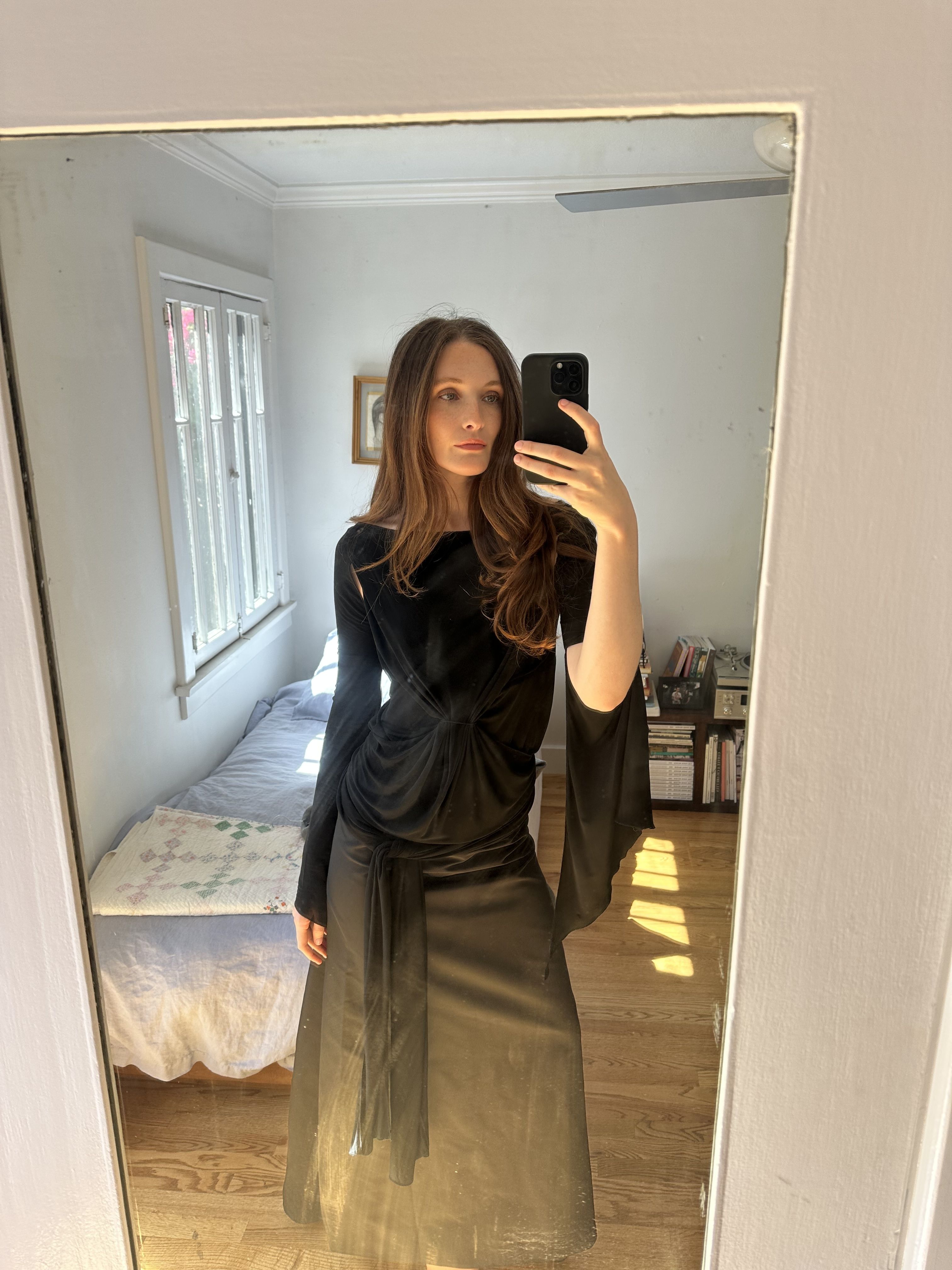 Grace O'Neill Dougherty styles a wraparound textured dark dress