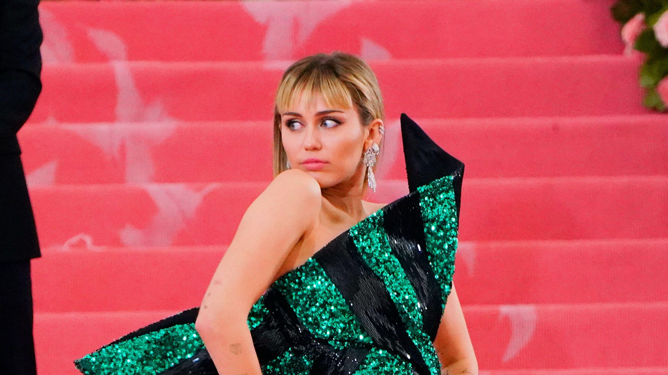 hannah montana green dress Did Miley Cyrus Go to the 2019 Met Gala as Montana? Neck to heel