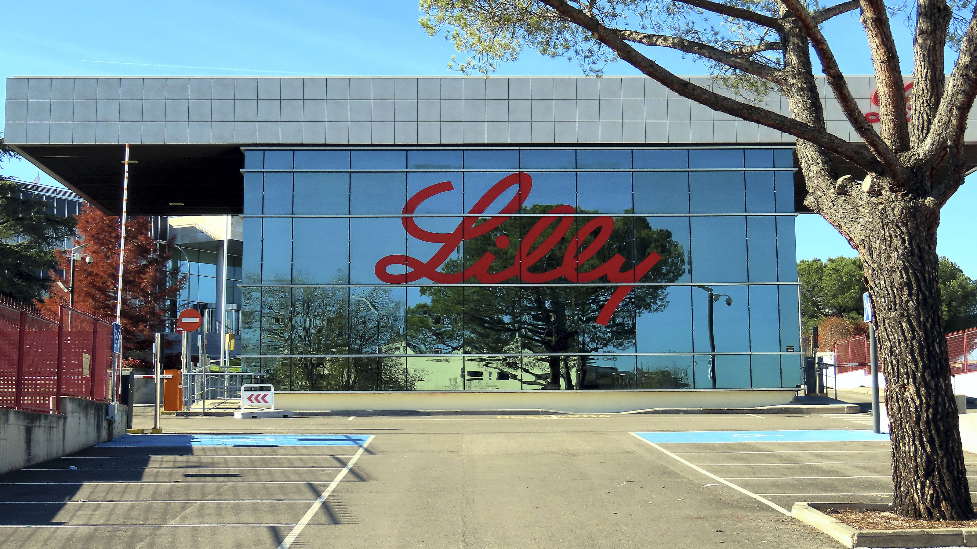 Eli Lilly logo on side of building headquarters in Spain