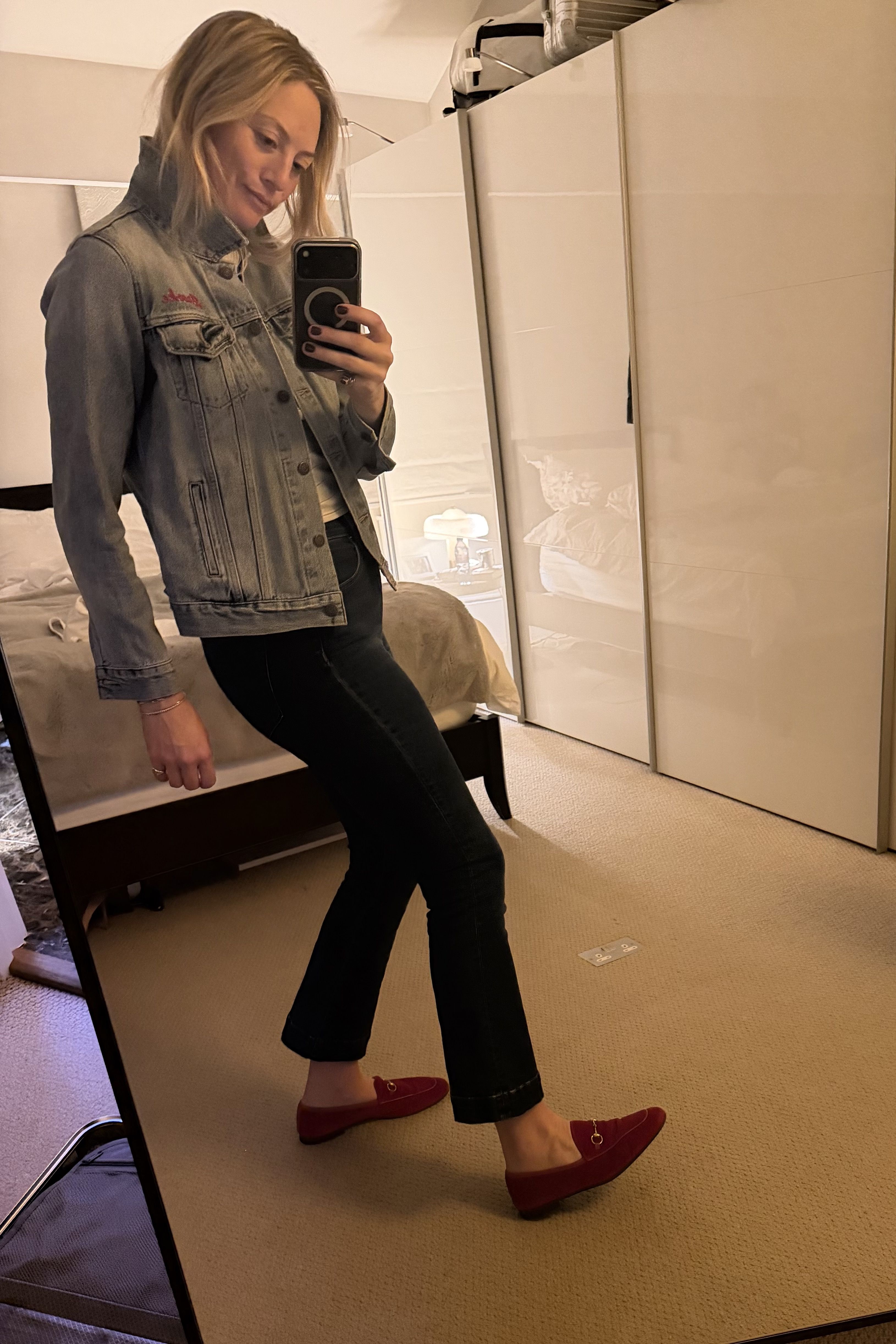 Brooke Ely Danielson styles a denim jacket and jeans with red mocassins