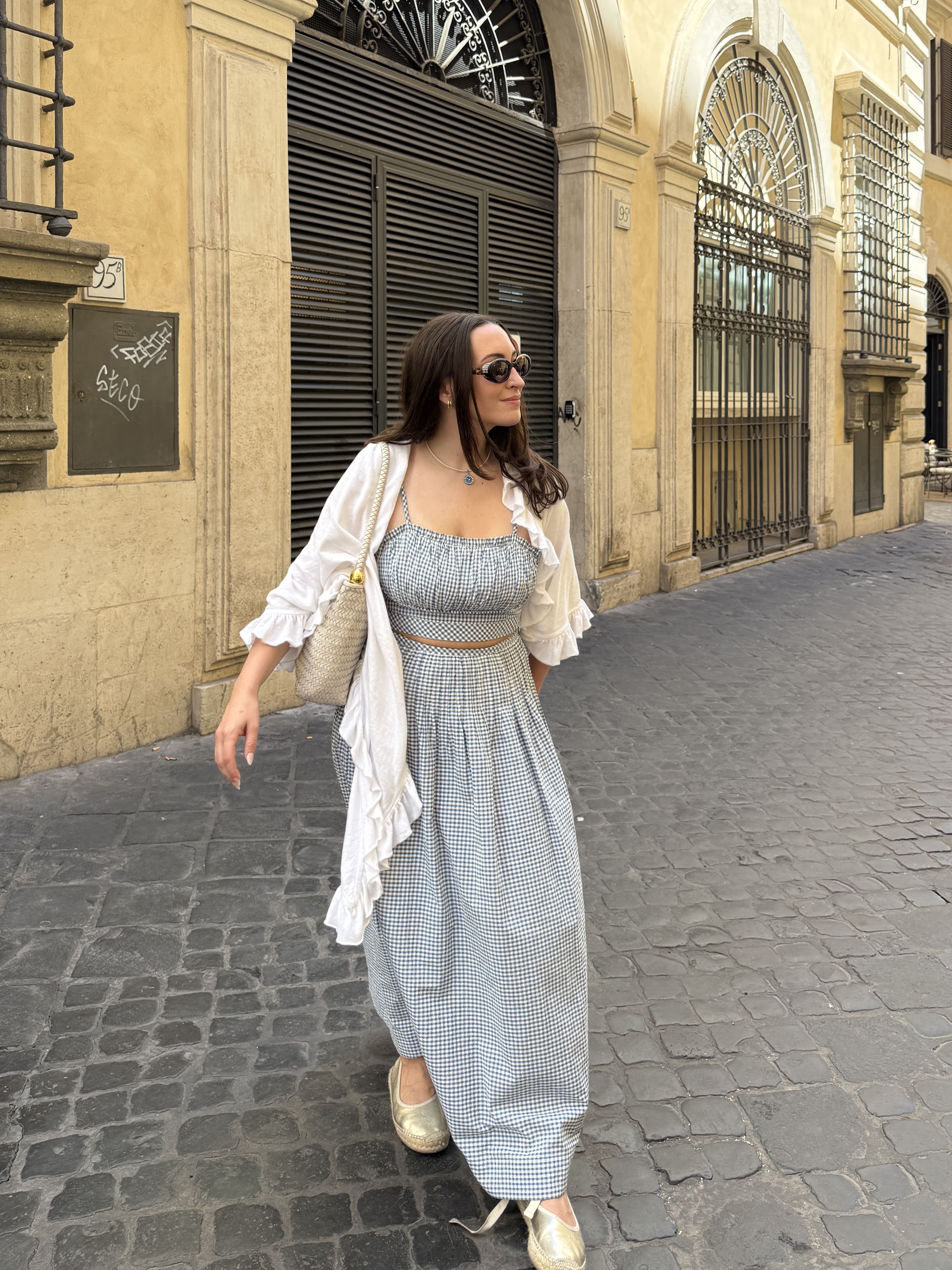 Bella Gerard wears a Hill House Home set on vacation