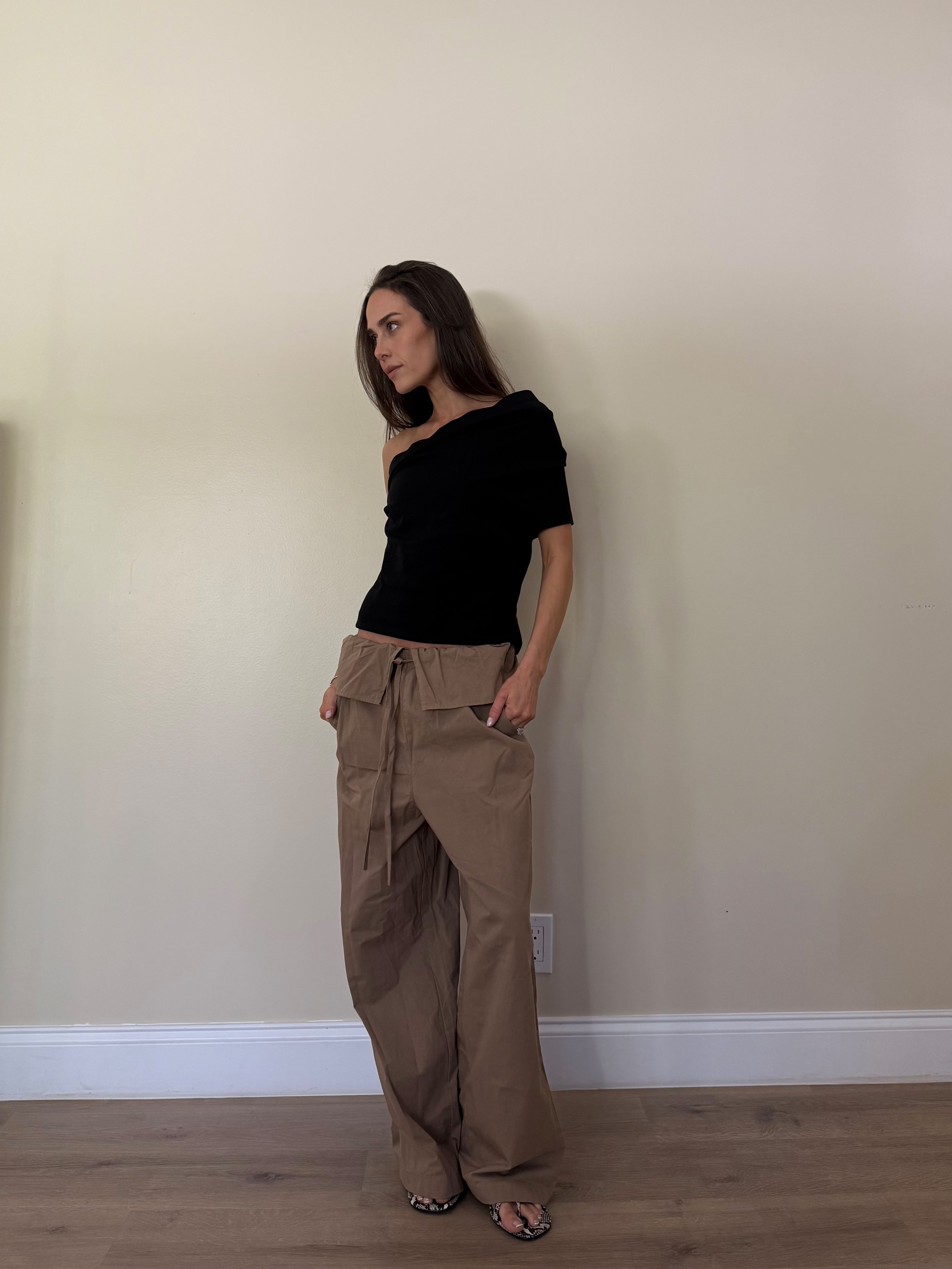 Kira Mackenzie Jackson's new closet includes lots of structural pants and asymmetric tops