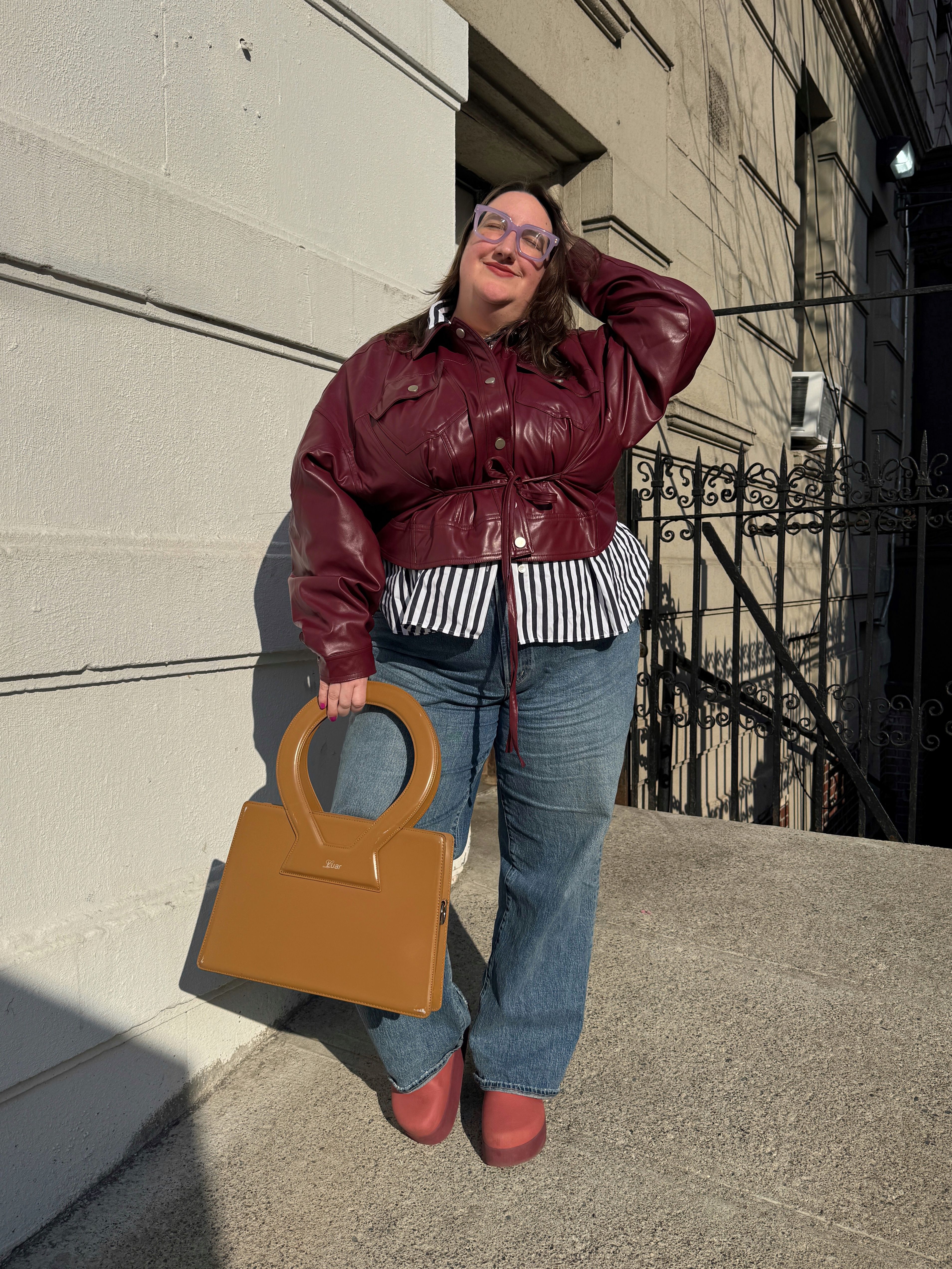 Sarah Chiwaya demonstrates her cinched-waist jacket outfit formula for spring