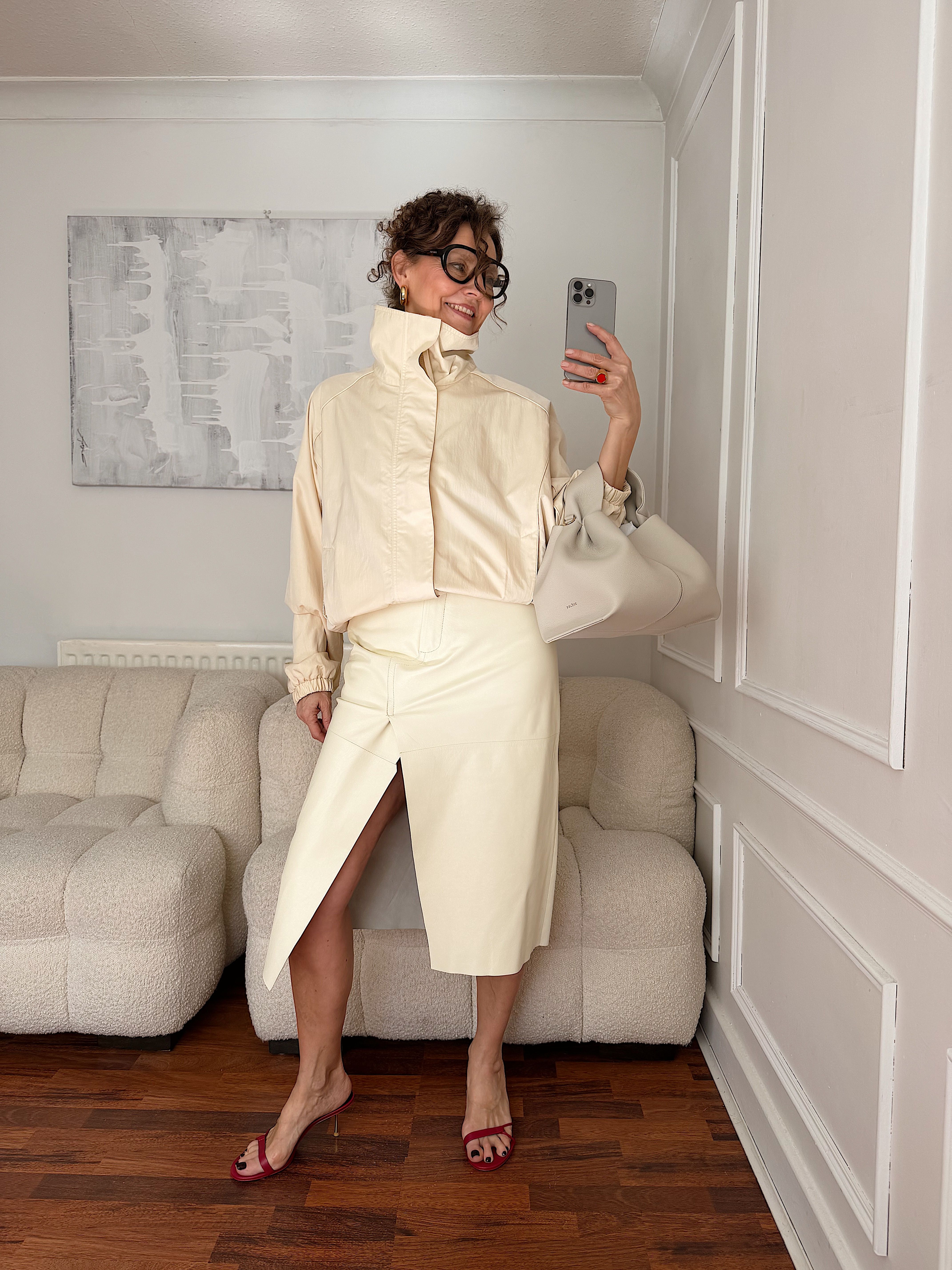 Renia Jazdzyk wears red sandals with neutrals