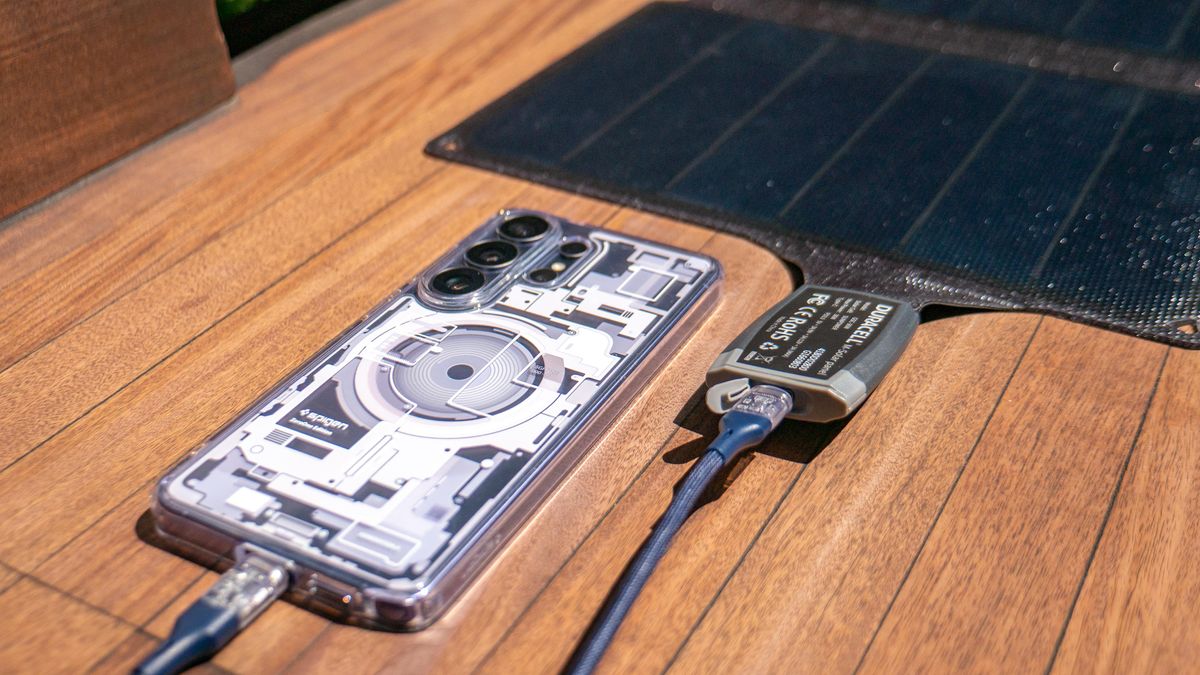Duracell M-Series Portable Solar Panel charging a phone.