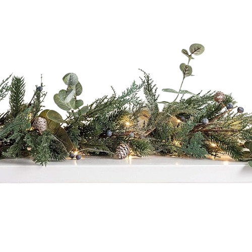garland with mixed leaves, pine cones and white lights on a plain white shelf on white background
